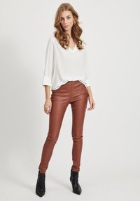 Object OBJBELLE COATED - Leggings - Trousers - brown patina