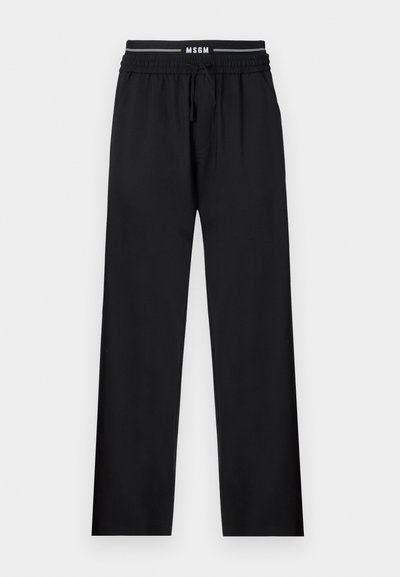 Black pants with a relaxed fit, elastic waistband, adjustable drawstring, and side pockets. Made of smooth fabric with no patterns.