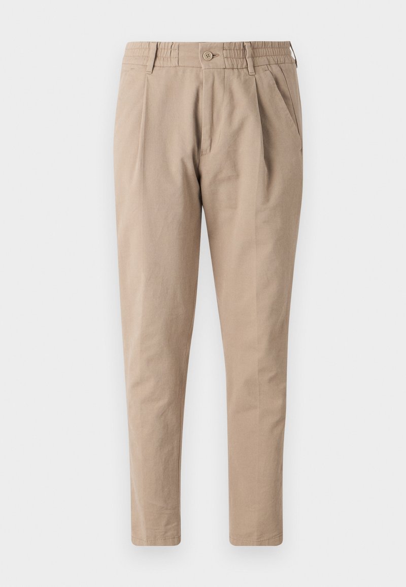 Pantalons en coton beige avec une coupe décontractée, taille élastique, fermeture à bouton et poches latérales. Texture lisse, conception à jambes fuselées.