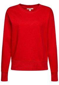 Sweatshirt rouge avec un col rond, des manches longues et des poignets côtelés. Confectionné en coton texturé pour un look confortable et ajusté.