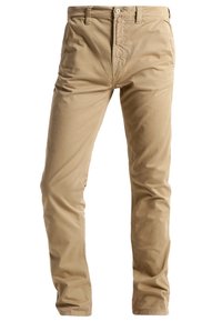 Beige bomullsbyxor med slim fit, med knappstängning, vanliga fickor och en mjuk textur. Enkel, mångsidig design.