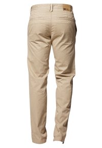 Beige bomullschinos med slim fit, med bakfickor och en brun läderlapp på midjebandet, slät textur och raka ben.