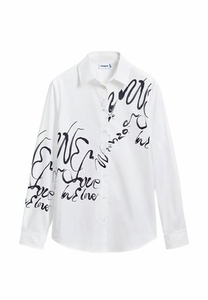White button-up shirt made of cotton, featuring black handwritten text and abstract designs across the front and sleeves.