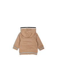 Sweat à capuche marron clair avec une texture lisse, accents rayés blancs et noirs sur les poignets et l'ourlet, présentant un design simple.