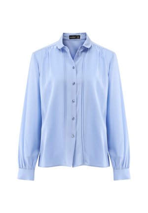 Helle blaue Langarmbluse aus glattem Stoff. Sie hat eine durchgehende Knopfleiste, Falten entlang der Brust und runde Manschetten.