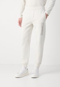 Calvin Klein HORIZONTAL LOGO SWEATPANTS - Treniņtērpa apakšdaļas - silver birch