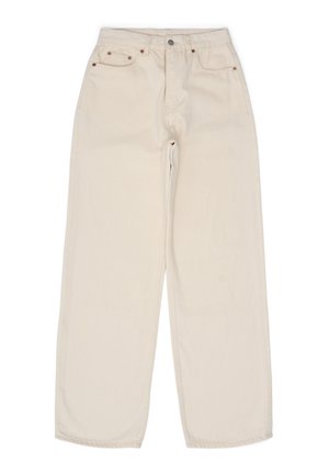 Beige wijde jeans van katoen. Voorzien van een knoopsluiting, voorzakken en subtiele stiknaad. Glad textuur met een ontspannen pasvorm.