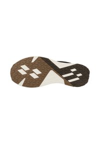 Svart och brunt sportskosula med en texturerad vit mittdel, som har ett diamantmönster och vinklade bruna accenter.