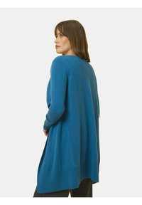 Langarm, open voorkant cardigan in soepel felblauw, gemaakt van zacht materiaal met ribgebreide manchetten en zoom, met een relaxte pasvorm en een rugsplit.
