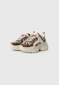 Chunky sneakers with a multi-patterned upper featuring zebra and tiger prints in brown, pink, and cream tones. Rubber sole with textured design.