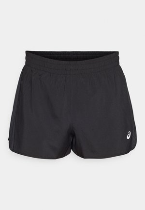 Black athletic shorts with an elastic waistband, smooth texture, curved hem, and side mesh accents. Features a small logo on the front.