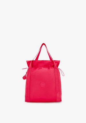 Lysende pink tote taske med dobbelte håndtag, snørelukning i toppen og et lille rundt logo-patch på midten foran.