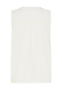 Blouse blanche sans manches avec un large empiècement et un détail plissé dans le dos, réalisée en tissu léger.