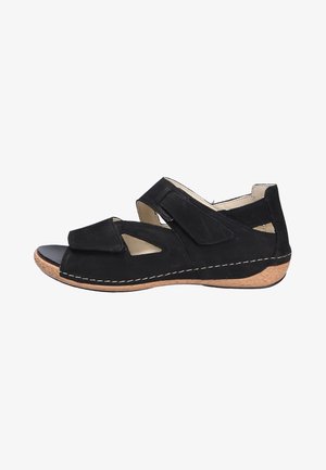 Zwarte sandalen met een leren bovenkant, dubbele klittenbandsluitingen, open teen ontwerp en een gevormde kurken zool met stiksels.