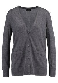 Grå kofta med V-hals, långa ärmar, knappstängning fram, två fickor och en mjuk yta. Tillverkad av ett mjukt, lätt material.