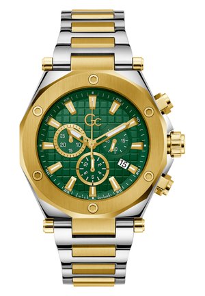 Guld- og sølvfarvet rustfrit stål ur med et oktogonalt urkasse. Grønt struktureret urskive, tre sub-urte, datovisning og fremtrædende markører.