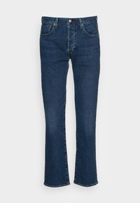 Mörkblå denimjeans med rak benpassform, femficksdesign, metallknapp och dragkedjestängning, samt subtila blekdetaljer.