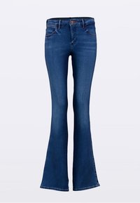 Tumši zili džinsu bikses ar zvana piegriezumu, piecām kabatām, rāvējslēdzēju un jostas cilpām. Izgatavotas no džinsa auduma ar gludu tekstūru un smalkām šuvju detaļām.