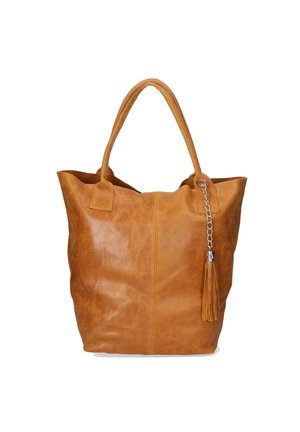 Tan leather tote bag with a textured finish, featuring two sturdy handles and a tassel accent attached by a silver chain.