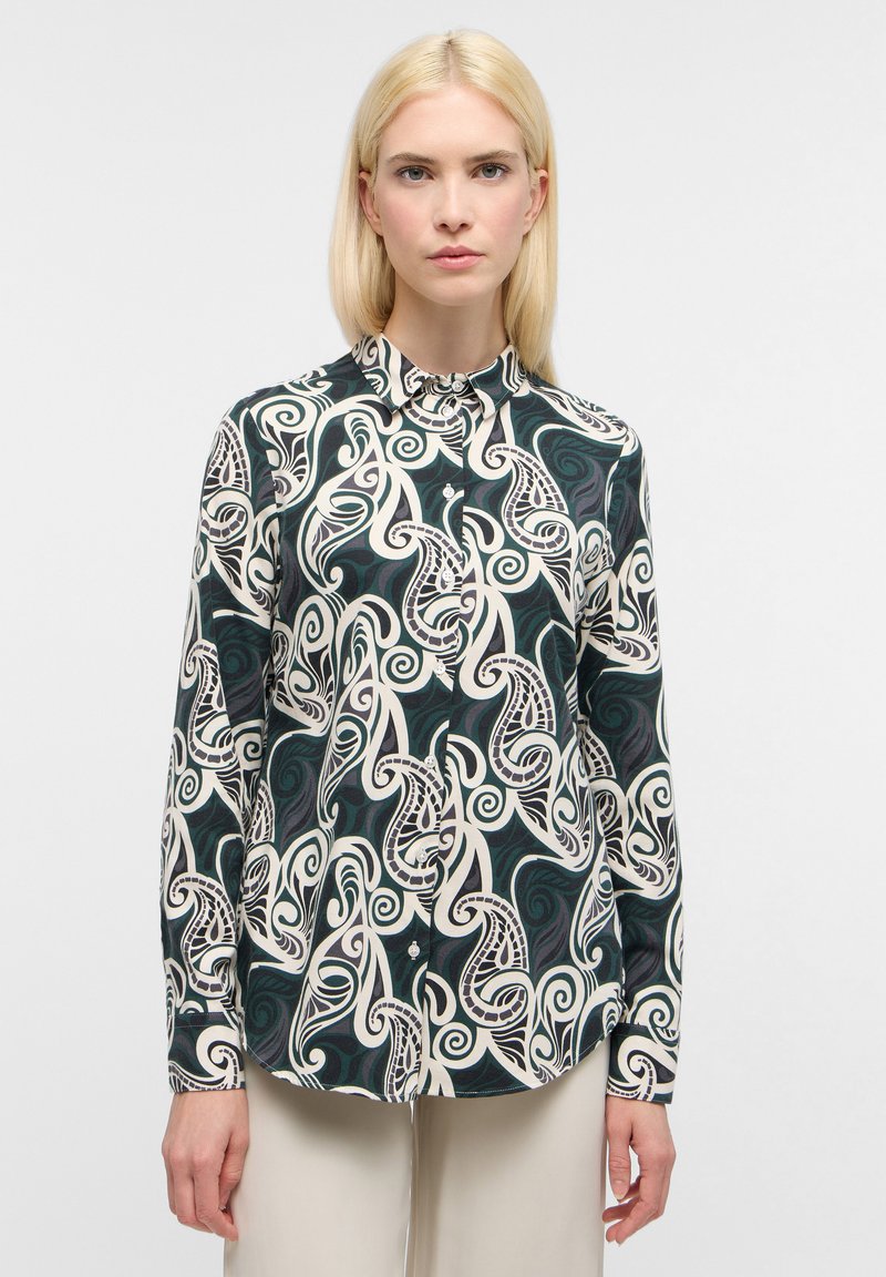 Long-sleeve shirt in dark green with a cream swirling paisley pattern. Features a collared neckline and buttoned front. Soft fabric texture.