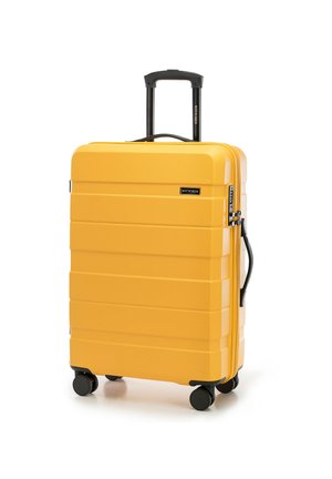 Hardshell suitcase in bright yellow with a textured finish, black wheels, and retractable handle. Features horizontal lines and brand logo.