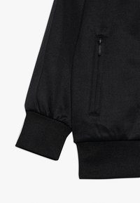 Molo MERRIN - Kofta - black