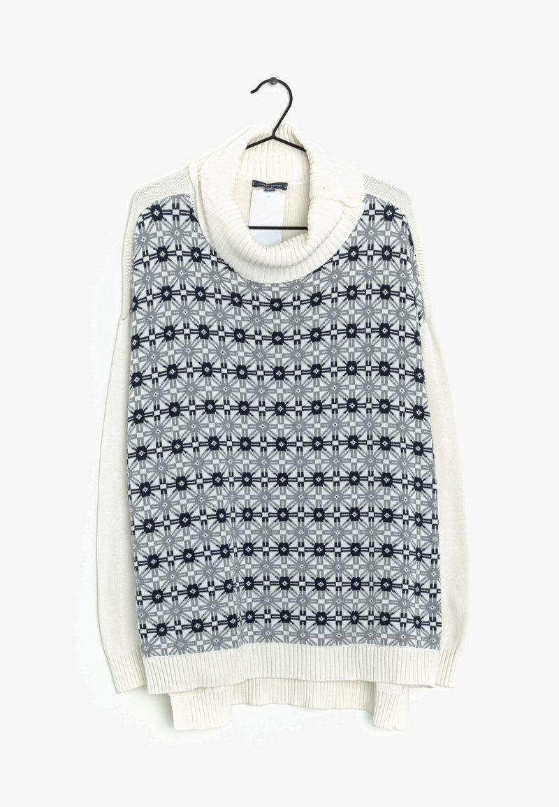 Pull en tricot avec col roulé, présentant un motif gris et blanc de fleurs et de formes géométriques, des poignets côtelés et un ourlet.