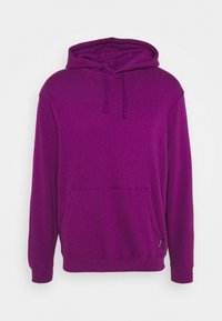 Felpa con cappuccio di un vivido colore viola. Realizzata in tessuto morbido, con tasca a marsupio frontale, cappuccio regolabile con cordini e polsini a costine.
