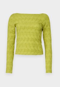 Grønt langermet topp med teksturert kviltet mønster, firkantet halslinje og tettsittende design. Laget av lette materialer.