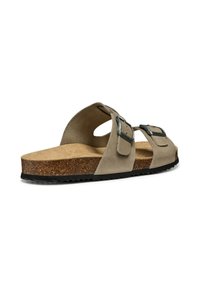 Infradito beige con due fibbie metalliche regolabili, soletta in sughero, suola in gomma testurizzata e design a punta aperta e arrotondata.