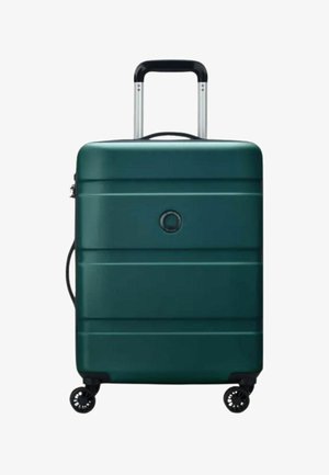 Valigia rigida verde scuro con quattro ruote nere girevoli, manico telescopico esteso e logo circolare centrale sul davanti.
