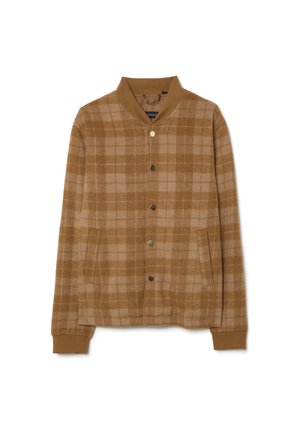 Veste à carreaux marron en tissu doux. Dotée d'une fermeture à boutons sur le devant, de deux poches latérales, de poignets côtelés et d'un col. Motif à carreaux discret sur l'ensemble.