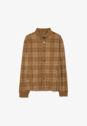 Giacca a quadri marrone realizzata in tessuto morbido. Presenta una chiusura frontale con bottoni, due tasche laterali, polsini a costine e un colletto. Discreto motivo a quadretti su tutta la superficie.