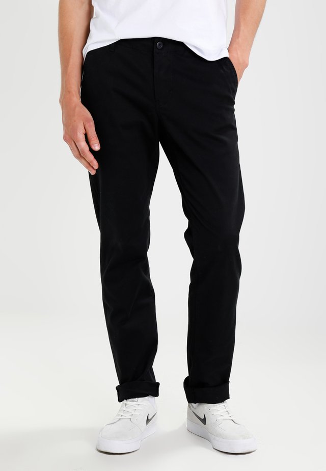 KERMAN - Chinos - black