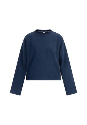 Sweatshirt din bumbac de culoare bleumarin, cu mânecă lungă, guler rotund, croială lejeră și tiv drept. Prezintă umeri lăsați și detalii minime de cusătură.