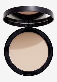 Kompaktpuder med ett svart fall och reflekterande lock, med ett mjukt, ljusbeige puder inuti. Inga synliga mönster eller detaljer.