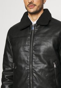 Lindbergh JACKET - Chaqueta de cuero sintético - black
