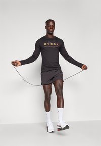 Puma HYROX RUN CLOUDSPUN TEE - Longsleeve - black
