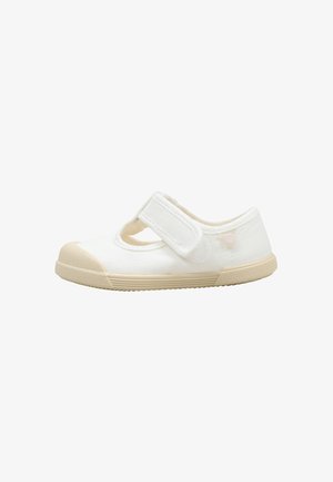Chaussure blanche pour tout-petit avec semelle en caoutchouc beige et bride ajustable à velcro sur le dessus, présentée sur fond blanc.