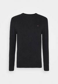 Pull noir à manches longues avec col rond, doté de poignets et d'un ourlet côtelés, présentant un petit logo rouge, blanc et bleu sur le côté gauche de la poitrine.
