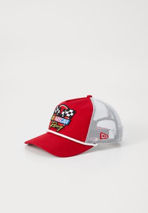 Red baseball cap with white mesh back, featuring an embroidered NASCAR Racing logo and checkered flag design on the front. Flat brim.