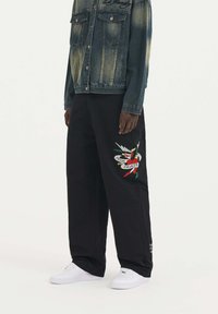 Ed Hardy - TRUE TILL DEATH BAGGY SKATER - Trousers - black Thumbnail Image 1