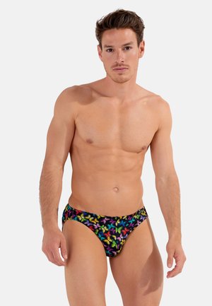 Bunte Schwimmbrieftaschen mit einem schwarzen Hintergrund und einem Schmetterlingsmuster in lebhaften Farben. Hergestellt aus dehnbaren Materialien, die für Komfort sorgen.