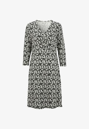Zwart knielang jurkje met een witte kleine bloemprint, V-hals en driekwart mouwen.