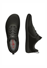 Black athletic shoes with mesh upper, lace closure, and textured sole. Featuring a red logo on the insole and a pull tab at the heel.