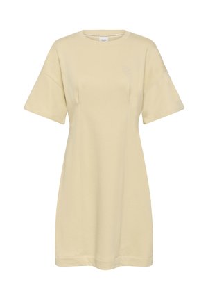 Bež kratka majica-haljina s okruglim vratom, opuštenog kroja i suptilnim okomitim šavovima sprijeda.