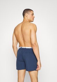 Ellesse TEYNOR - Swimming shorts - navy/white