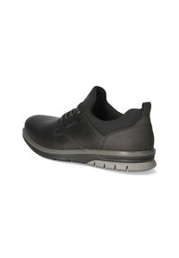 Chaussure en cuir noir avec un bout arrondi et une semelle en caoutchouc grise. Présente un design à lacets et de subtils détails de couture. Texture lisse sur l'ensemble.