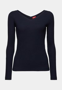 Naiset, vartalonmyötäinen ribbikuvioinen pitkähihaine paita tumma tummansininen, jossa V-pääntie ja hienovarainen rakenne, esillä valkoista taustaa vasten.