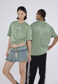 YOURTURN UNISEX - Marškinėliai su spaudiniu - light green